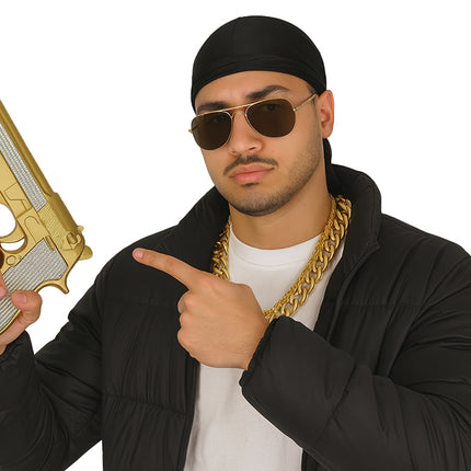 Paillettes d'or et d'argent pour faux pistolet