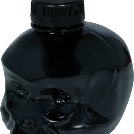 Tasse noire en forme de crâne avec une paille