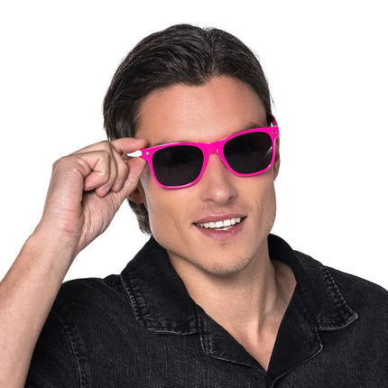 Lunettes de fête Pop rose fluo UV