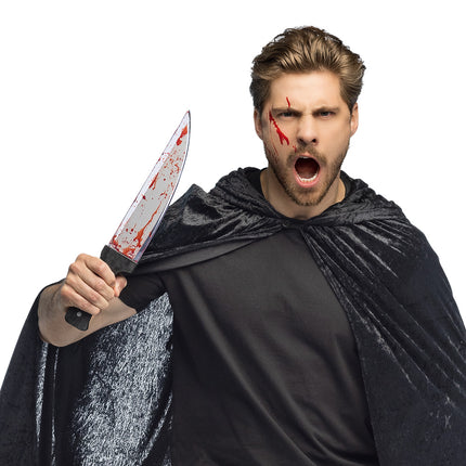 Faux couteau d'Halloween avec du sang 39cm