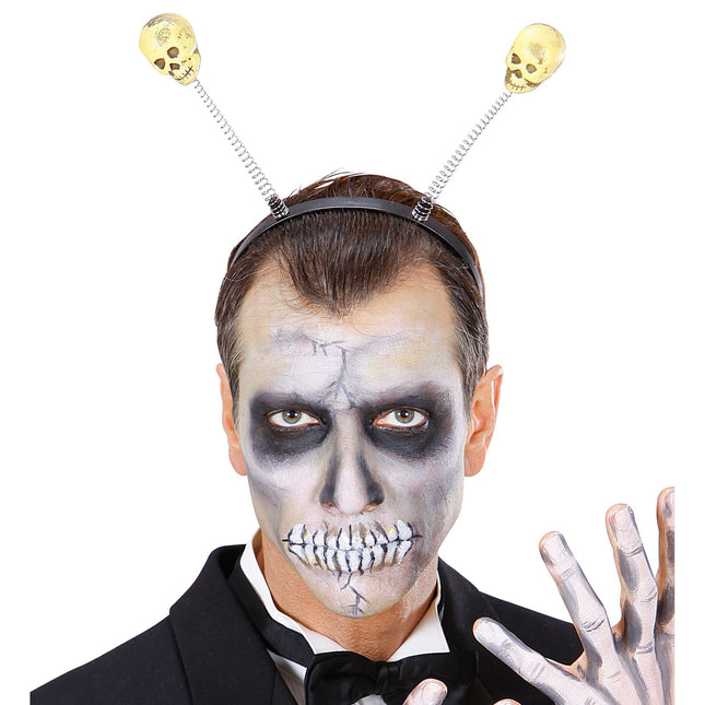 Bandeau d'Halloween crânes blancs