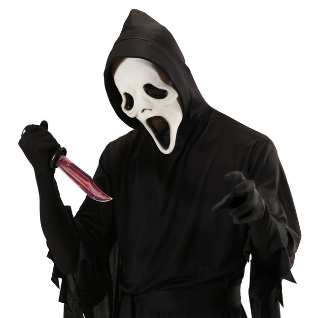 Faux couteau d'Halloween avec du sang