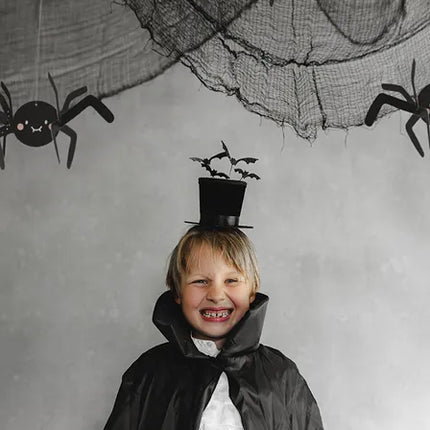 Chapeau serre-tête noir avec chauves-souris