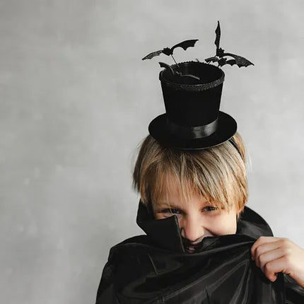 Chapeau serre-tête noir avec chauves-souris