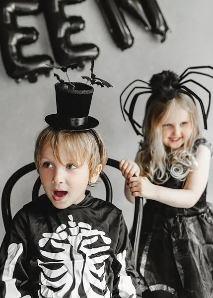 Chapeau serre-tête noir avec chauves-souris
