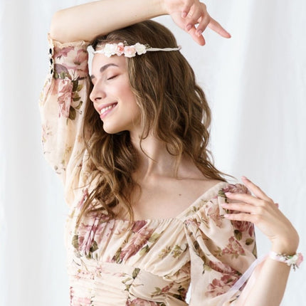 Bloemen Haarband Perzikkleurig van Partydeco koop je bij Partywinkel