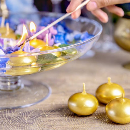 Drijfkaarsen Goud 4cm 50st van Partydeco koop je bij Partywinkel