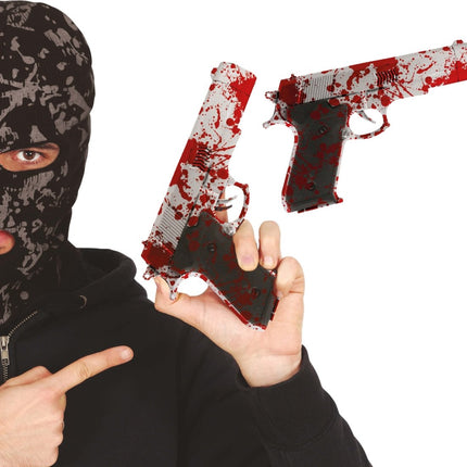 Halloween Nep Pistool Met Bloed 24cm van Fiestas Guirca koop je bij Partywinkel