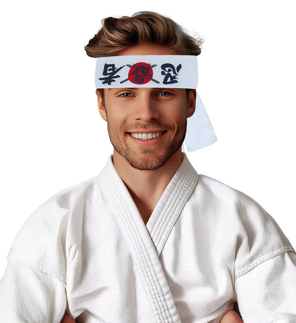 Karate Hoofdband Wit Rood van Fiestas Guirca koop je bij Partywinkel