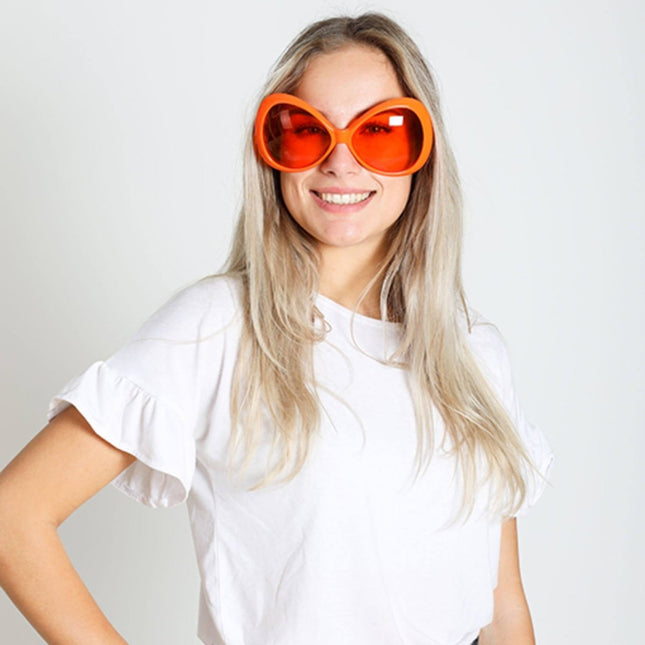 Oversized Oranje Bril van Folat koop je bij Partywinkel